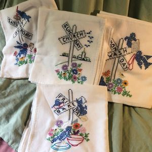Four chore days of the week hand embroidered towels; Fri.,Sat.,Sun. Mon.
